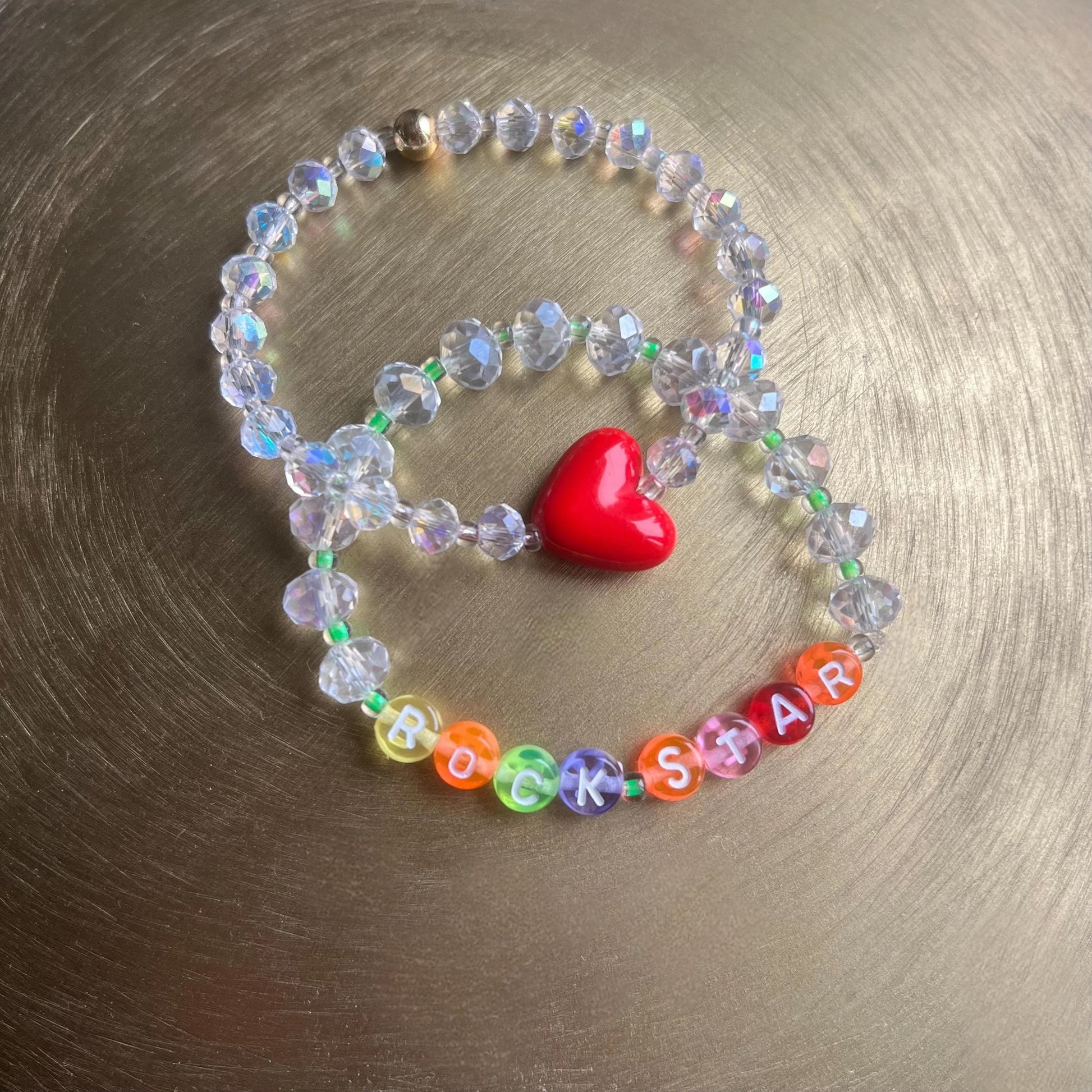 Heart of a Rockstar bracelet set lifestyle shot showing bold edgy jewelry design