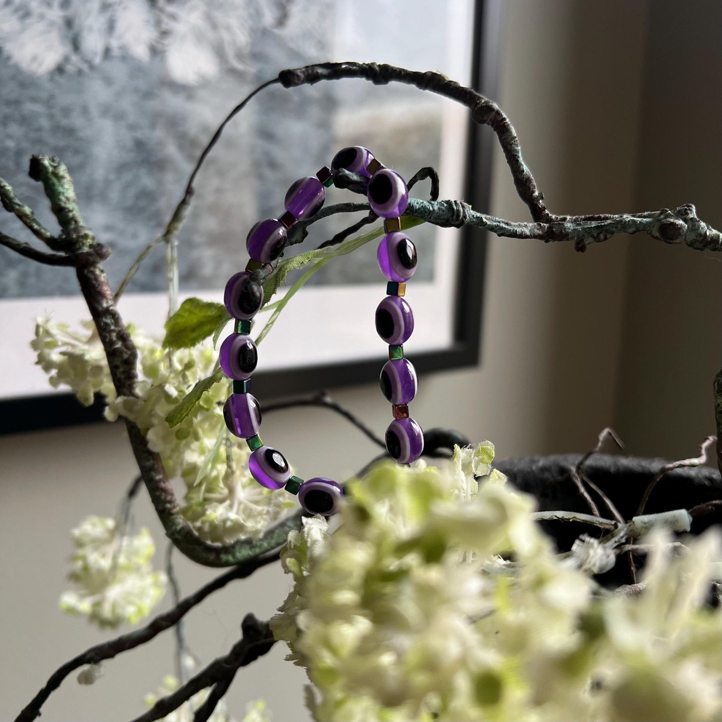 Trendy protection bracelet with semi-precious stones hanging 