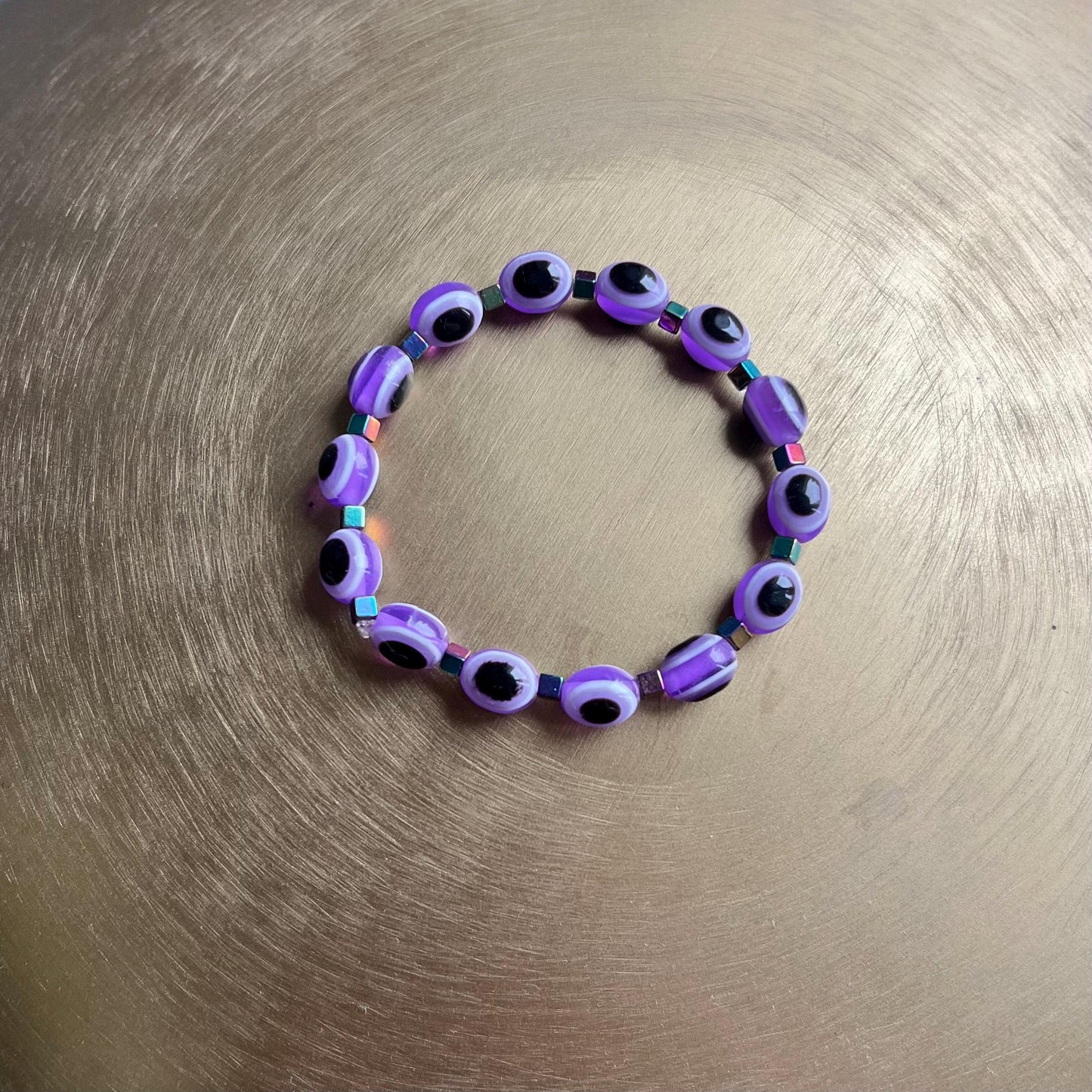 Spiritual evil eye bracelet with 10mm purple beads