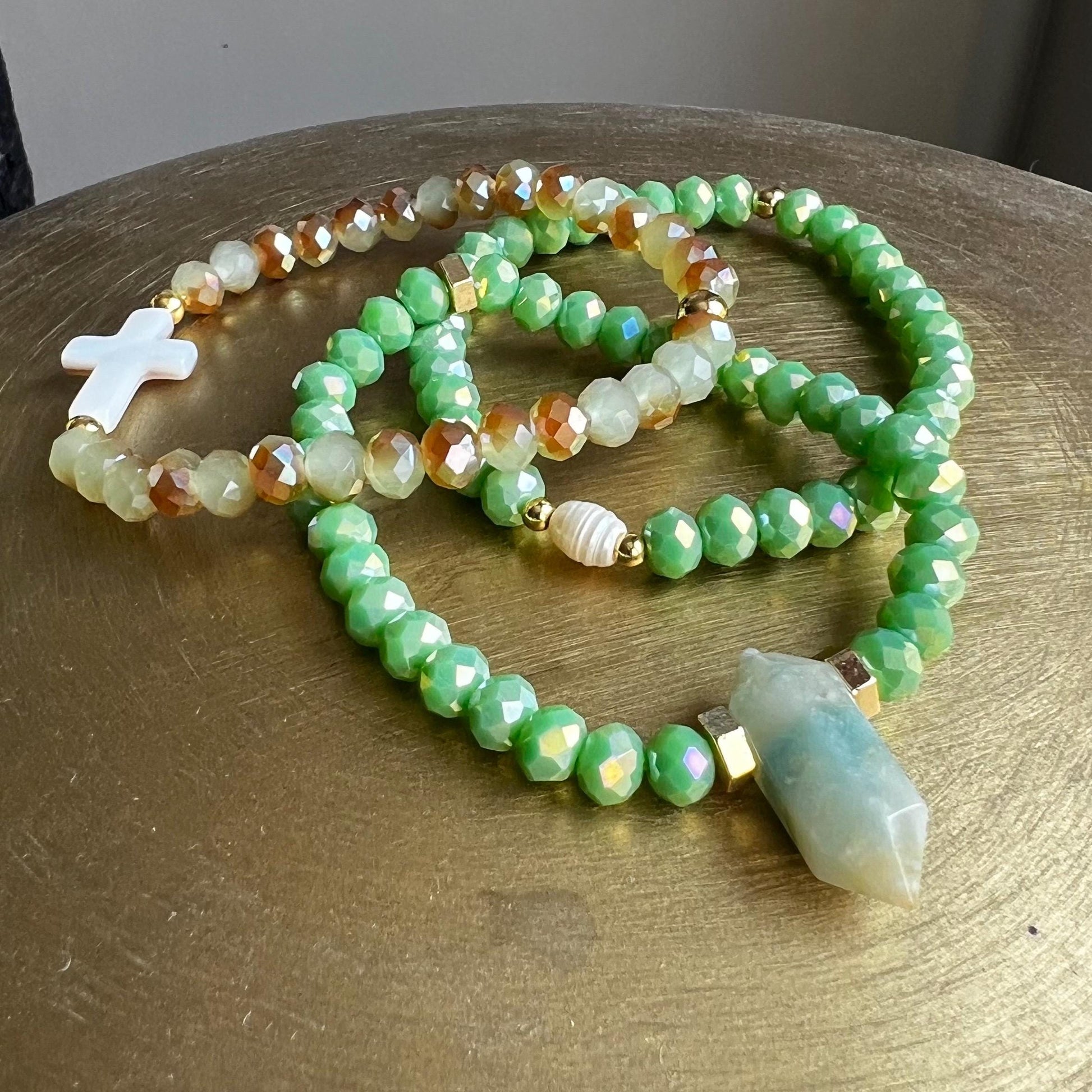 Vibrant friendship bracelet stack with beaded details