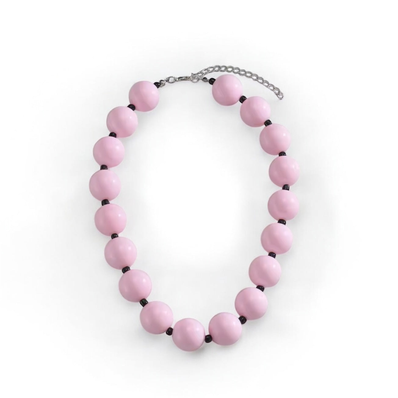 Harry Styles–inspired chunky pink and black bubblegum beaded necklace on white background