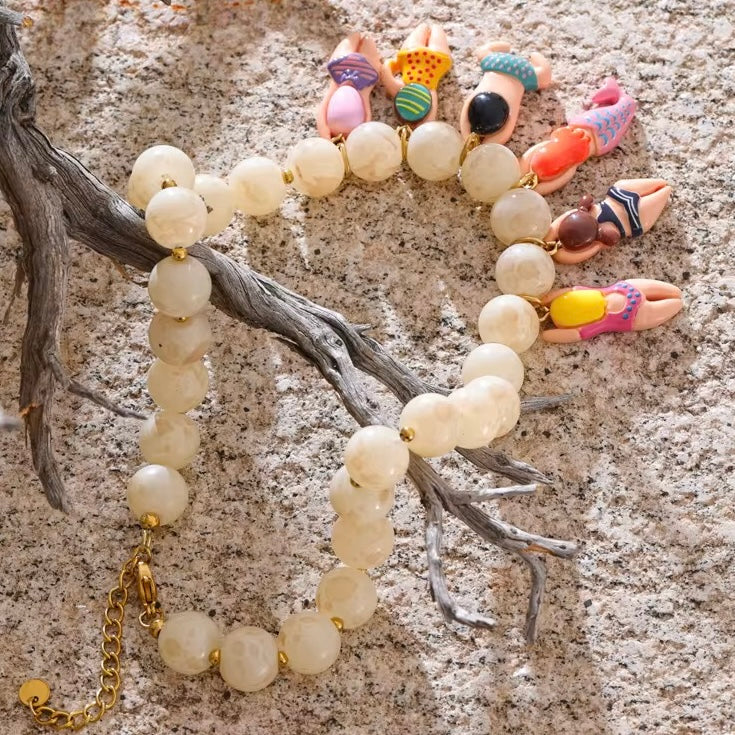 Summer statement necklace with ocean-themed charms and vibrant design