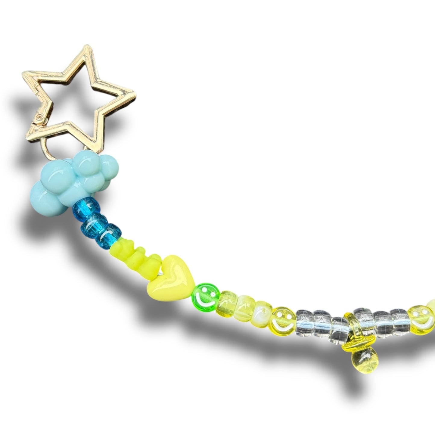 Fun and cute beaded keychain charm with pastel details and gold stars