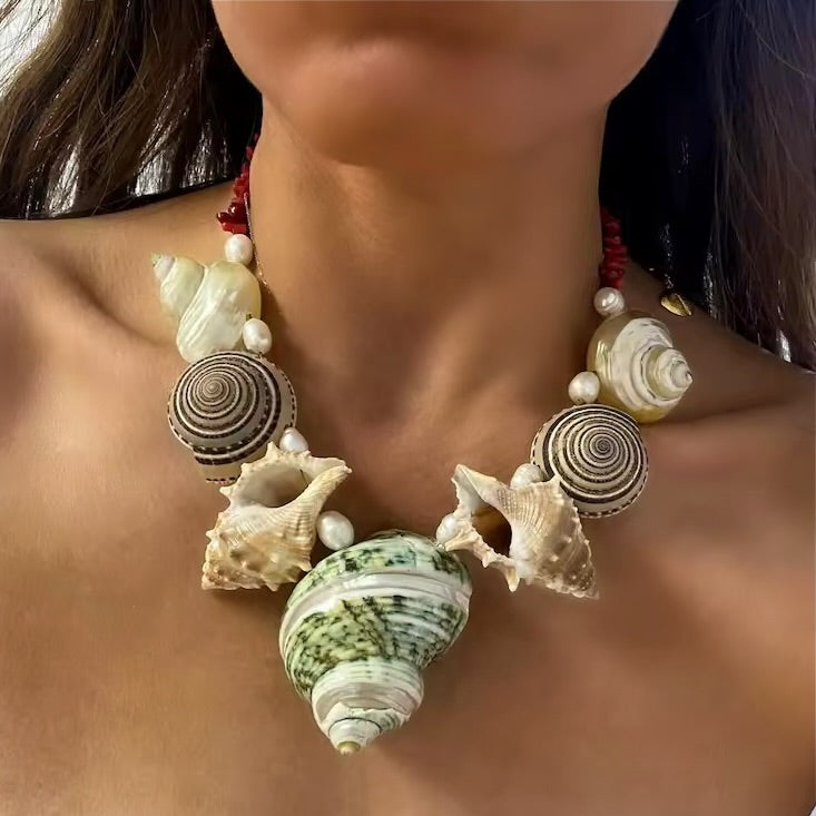 Ocean Muse seashell statement necklace worn with linen top