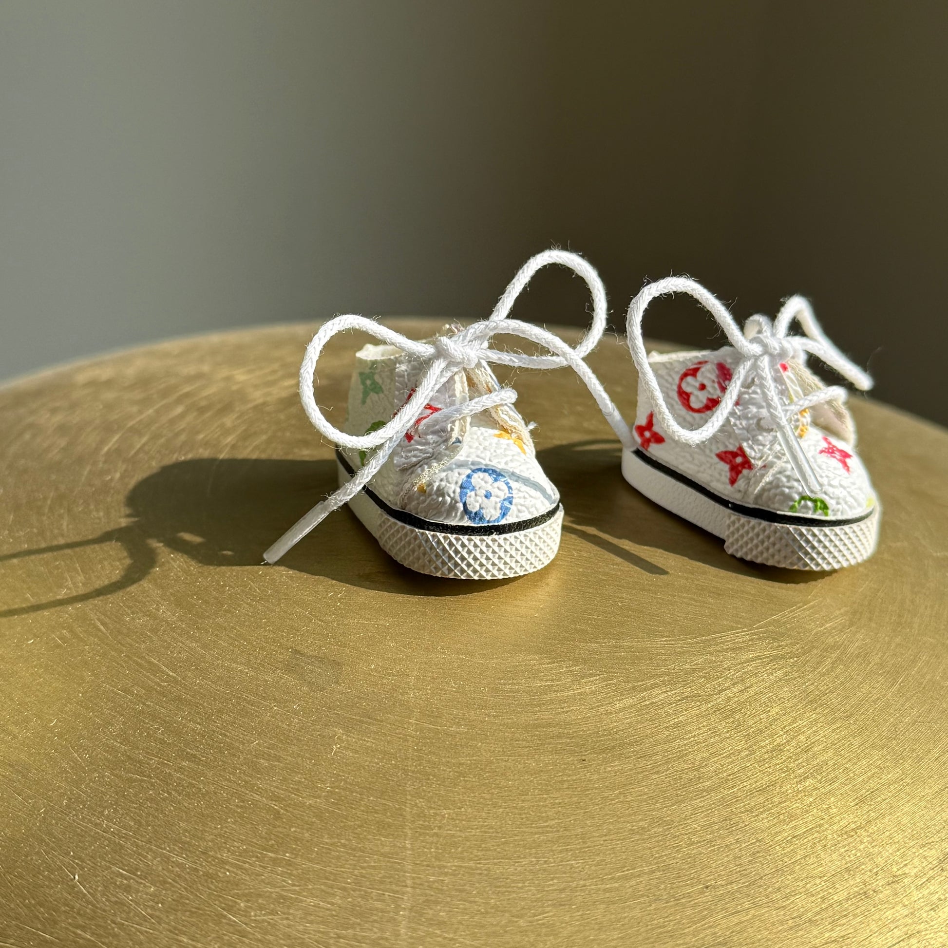 Labubu wearing Louis Vuitton inspired sneakers