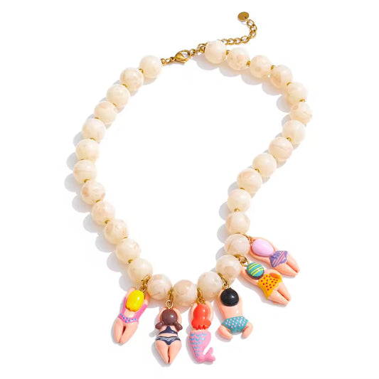 Playful Beach Babe necklace with colorful charms and beaded details, perfect for summer outfits