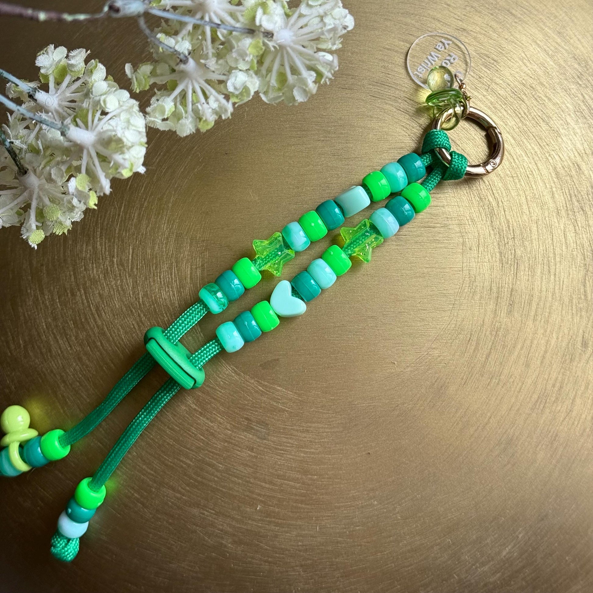 close-up of mint green pop labubu charm showing detailed features 