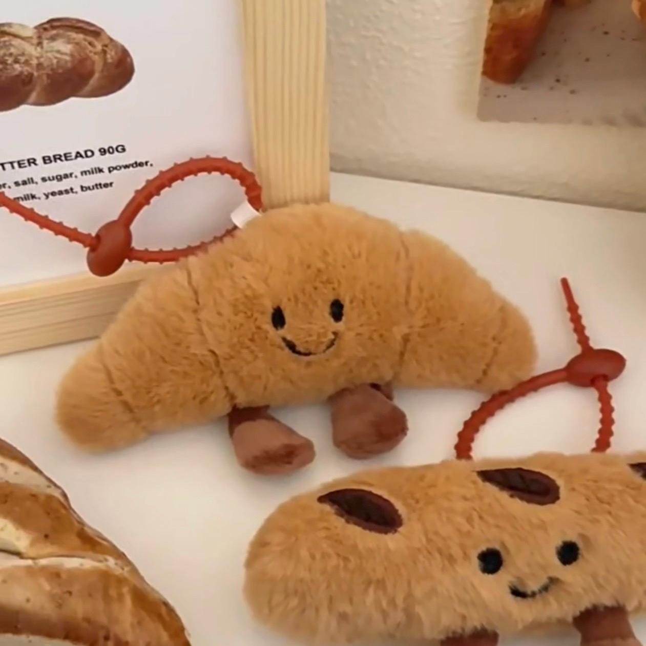Cute capybara croissant bag charm - soft fluffy keychain accessory